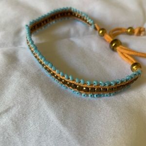 Bronze and powder blue beaded adjustable bracelet